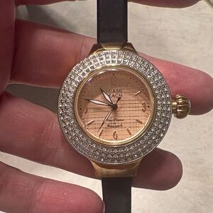 Miami watch. Pretty Cz stones all intact. Black band ‘Art Deco’  rose color